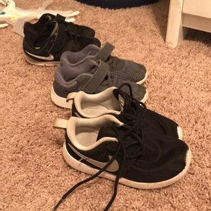 Three pairs of Nike shoes